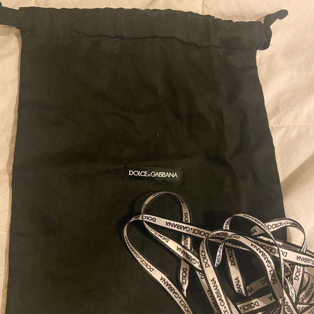 This is a dolce gabbana dust bag with shoe strings